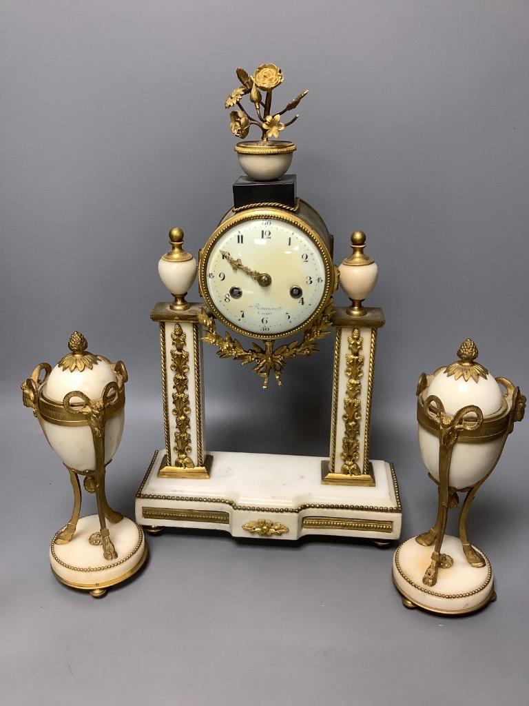 A French ormolu mounted and white marble clock garniture, c.1900, height 40cm